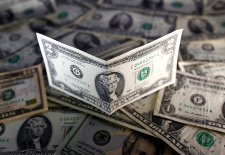 Dollar edges higher; inflation data and political debate loom