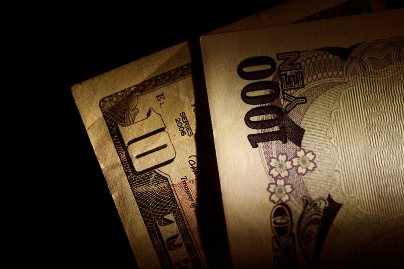 Yen slides to fresh lows as Japan authorities stick to sidelines