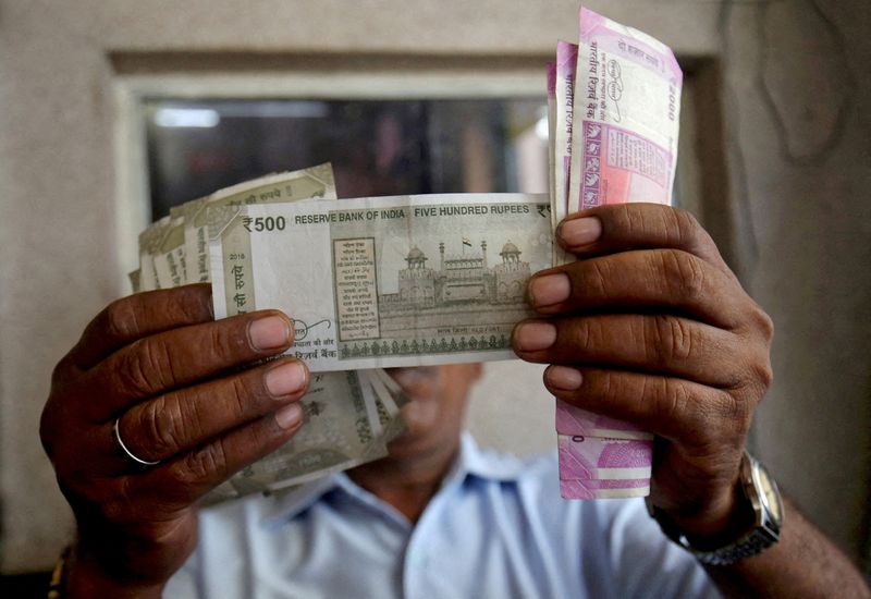 Rupee to trade in narrowest range in about 30 years on RBI's actions: Reuters poll